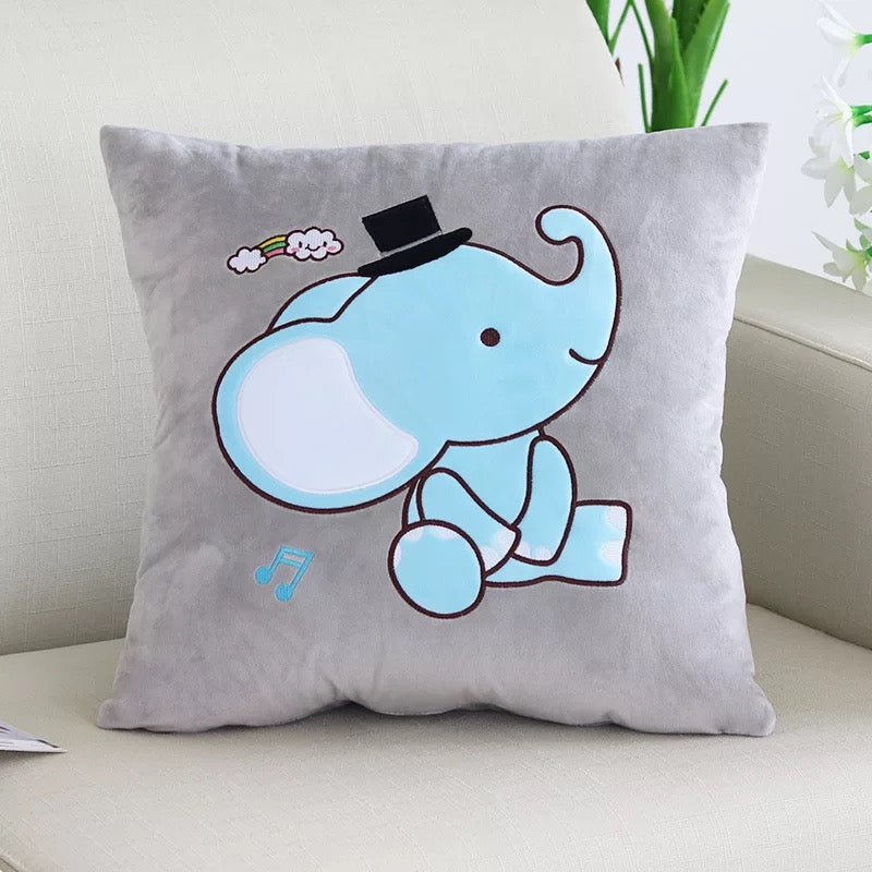 Soft grey plush nursery cushion cover featuring an embroidered blue elephant with a top hat and musical notes.