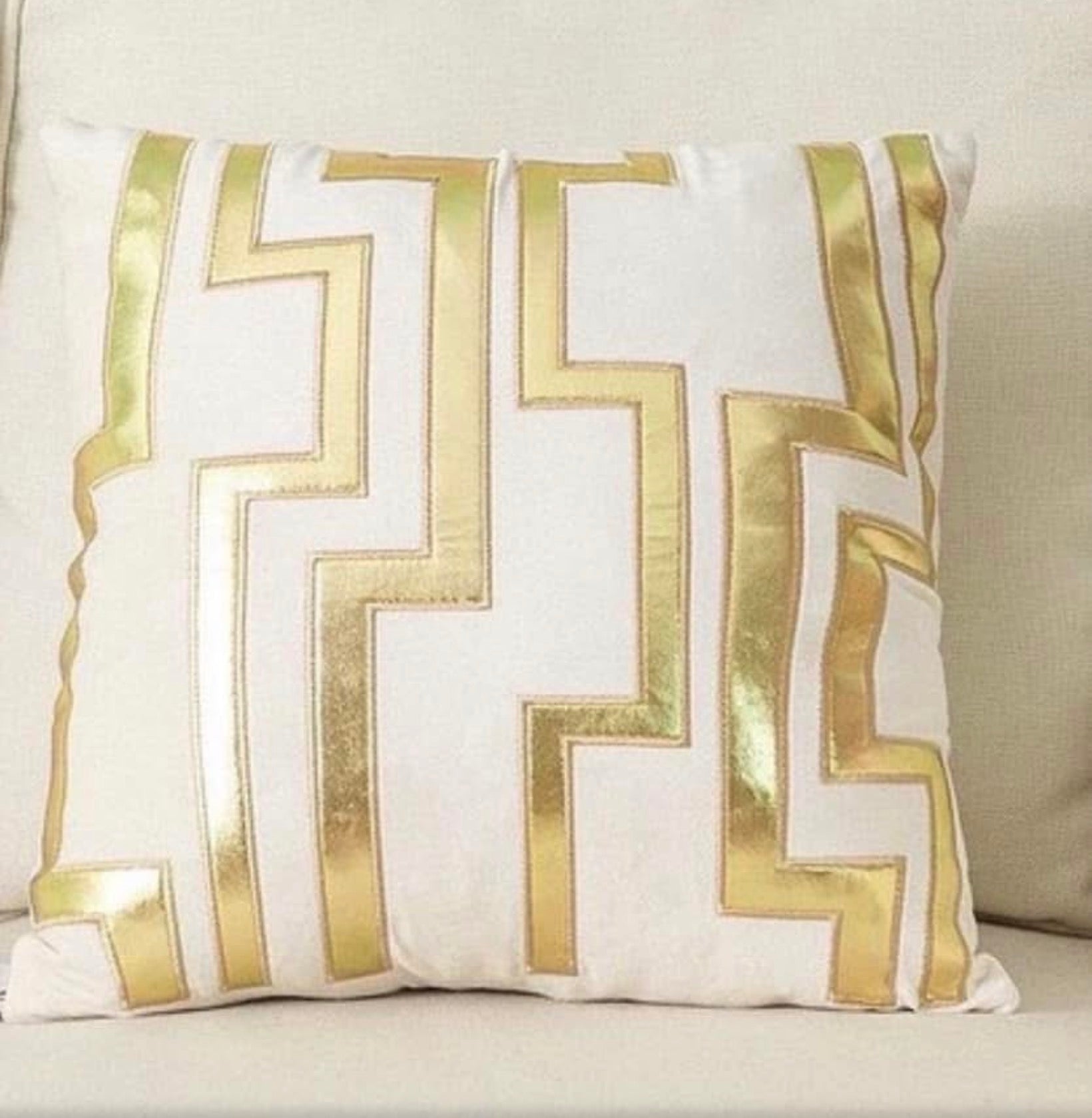 Front view of the Ivory Labyrinth cushion cover in cream white velvet with a metallic gold geometric maze pattern.