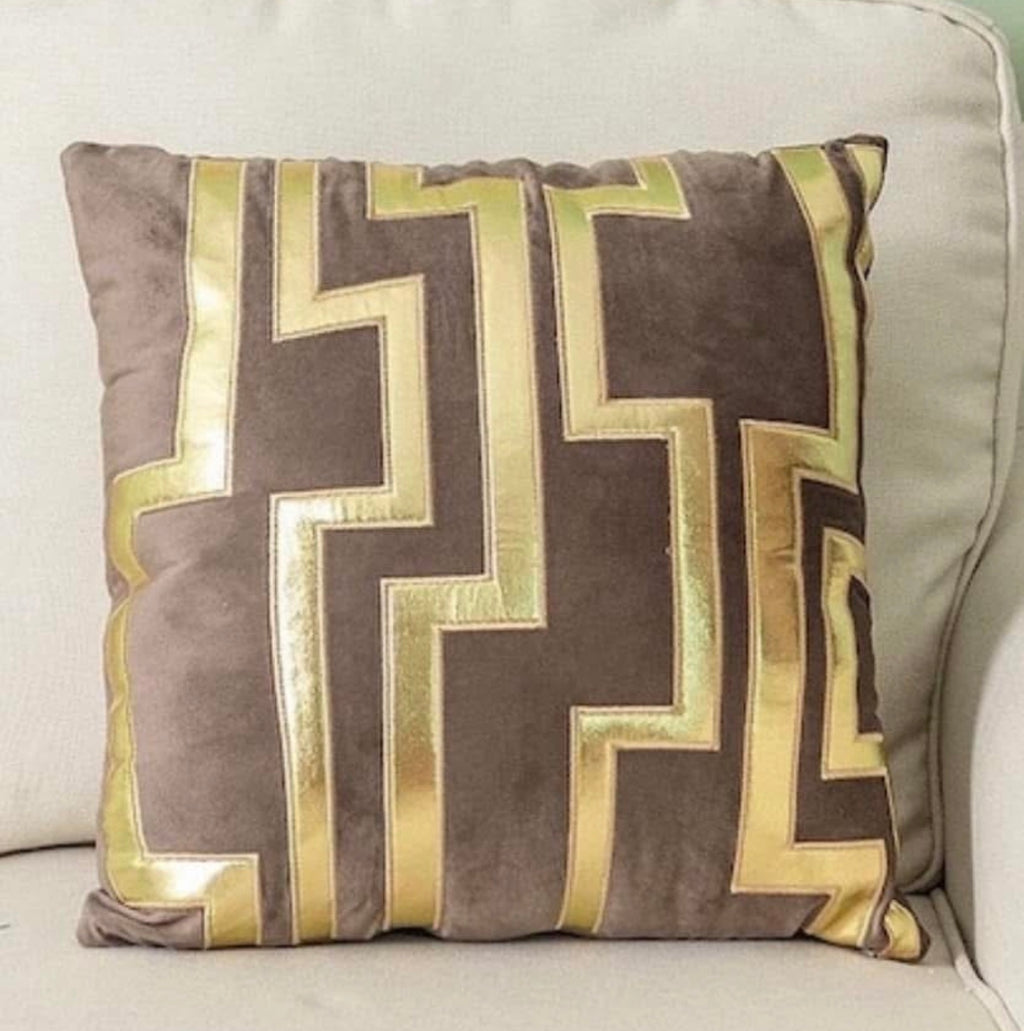 Front view of the Luxe Labyrinth cushion cover in mocha brown velvet with a metallic gold geometric maze pattern.