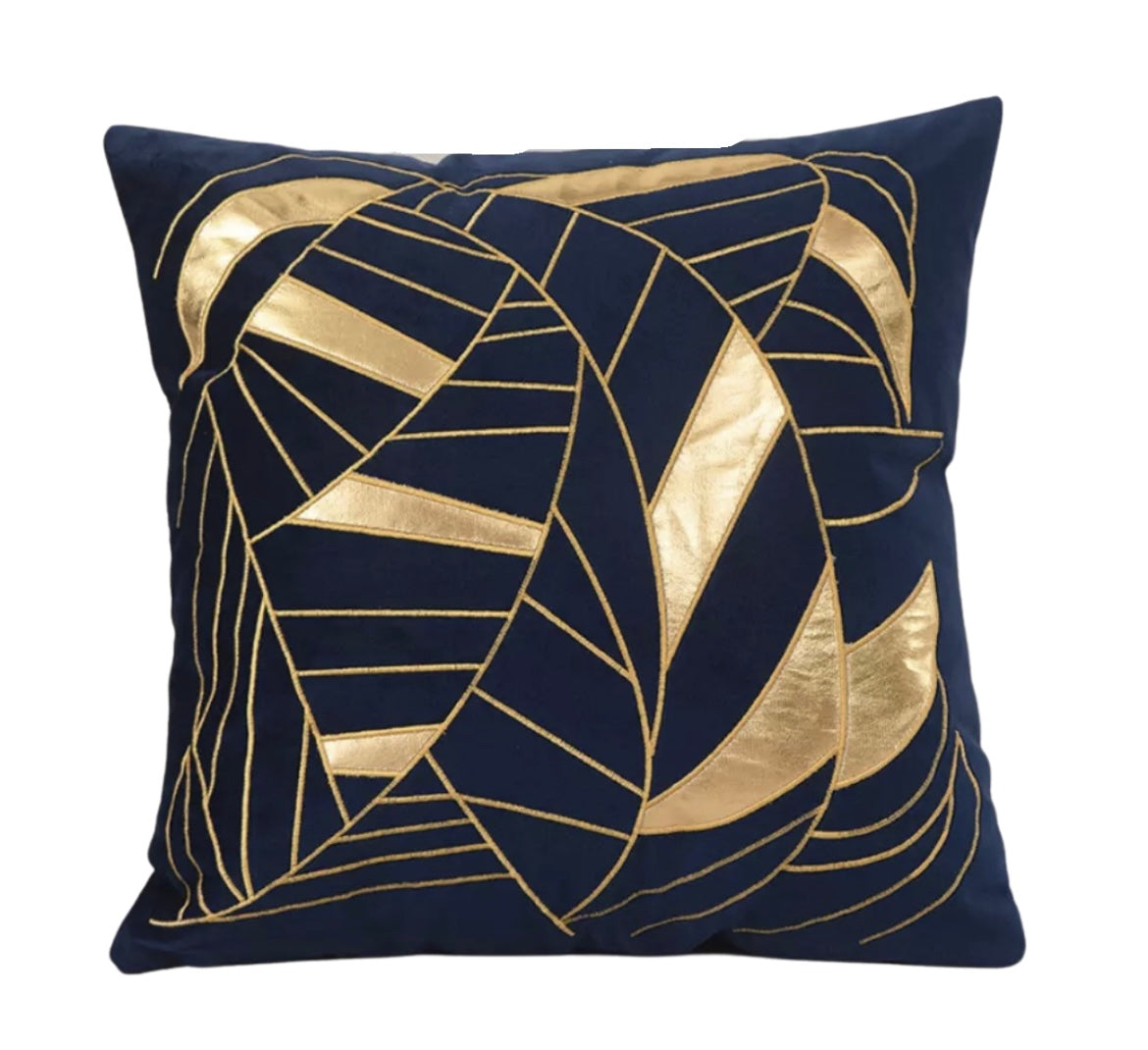 Front view of the Midnight Deco cushion cover in navy blue velvet with metallic gold geometric leaf pattern.