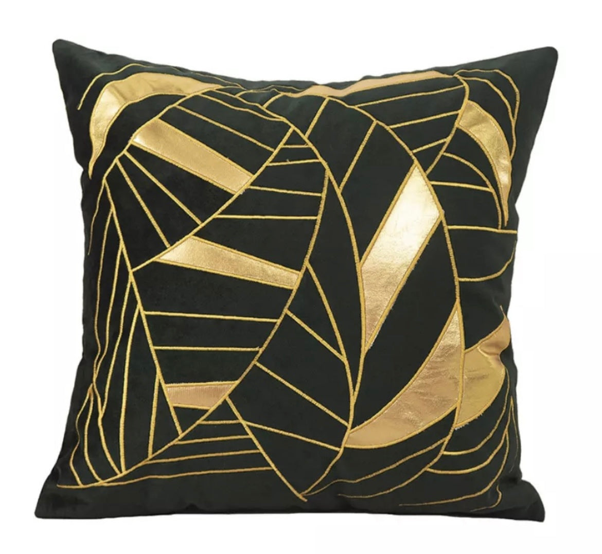 Front view of the Noir Artistry cushion cover in black velvet with a metallic gold geometric leaf pattern.