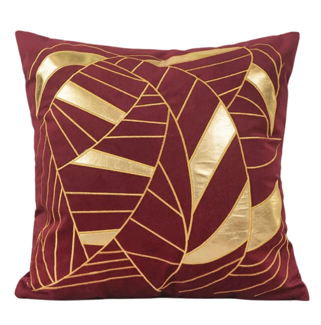 Full front view of the Opulent Deco 18x18 cushion cover, showing deep red velvet with shiny metallic gold geometric leaf pattern.
