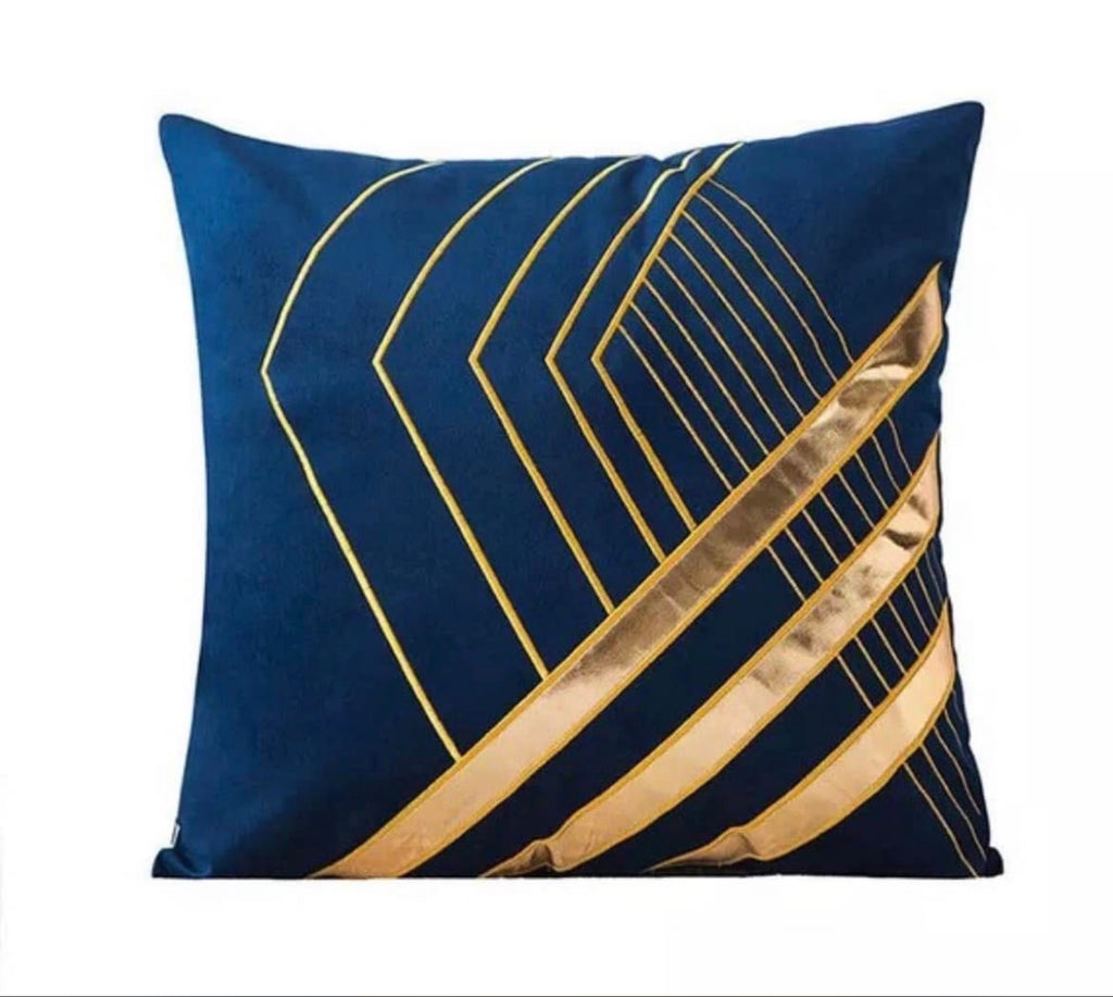Front view of the Royal Geo-Luxe cushion cover in navy blue velvet with a metallic gold geometric chevron pattern.